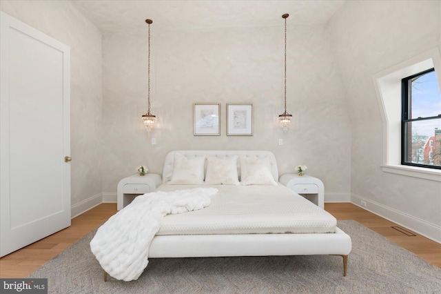 bedroom featuring hardwood / wood-style floors