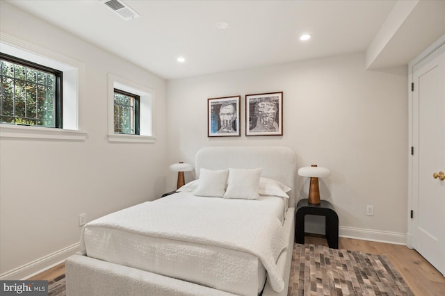 bedroom featuring light hardwood / wood-style floors