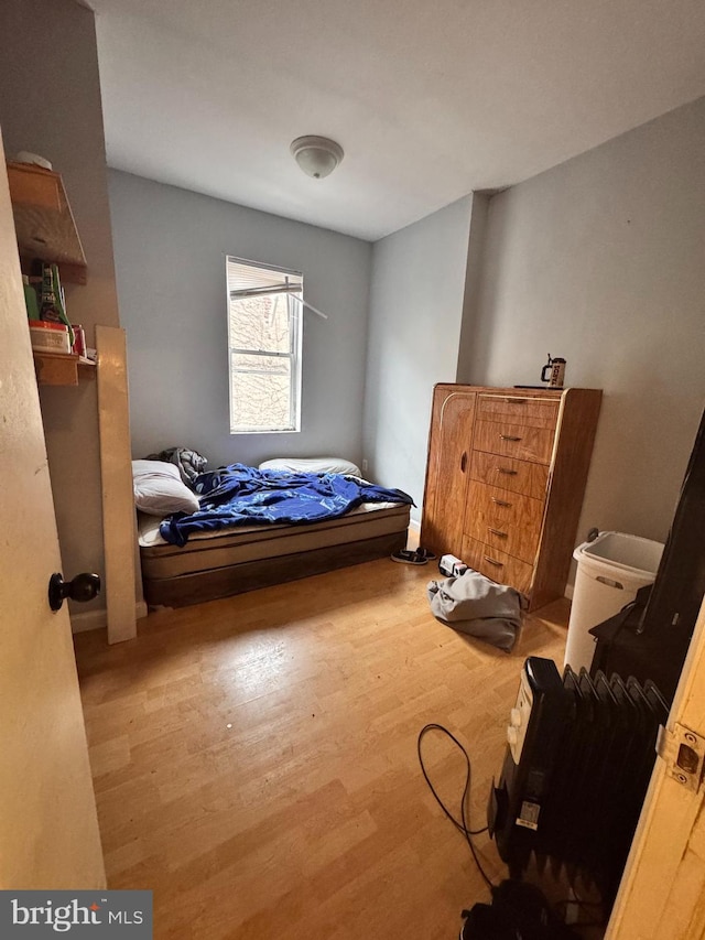 bedroom featuring hardwood / wood-style flooring