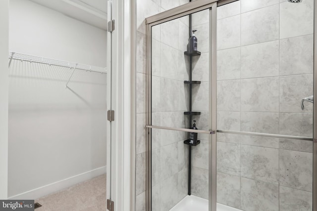 bathroom with an enclosed shower