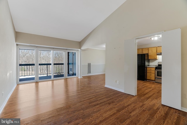 unfurnished living room with dark hardwood / wood-style flooring and high vaulted ceiling