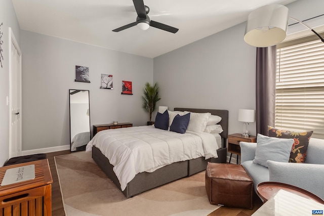 bedroom featuring ceiling fan and vaulted ceiling