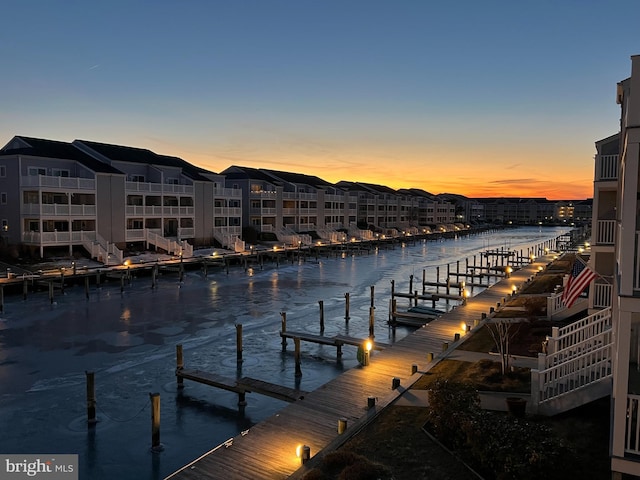 dock area with a water view