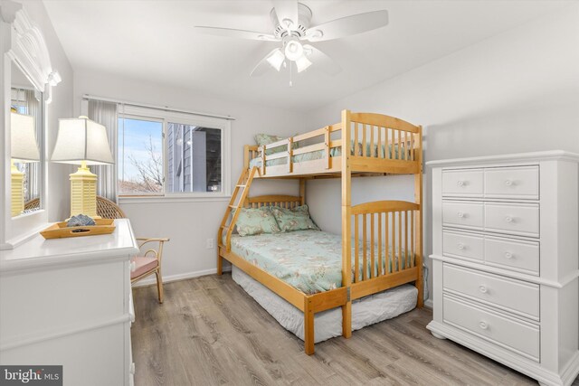 bedroom with light wood-type flooring