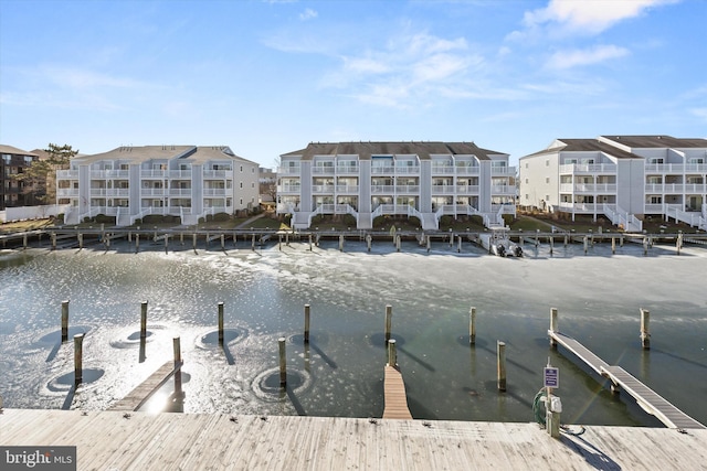 dock area with a water view