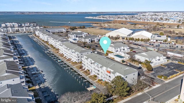 birds eye view of property featuring a water view