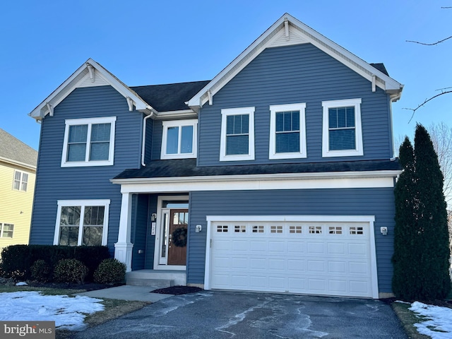 front of property featuring a garage