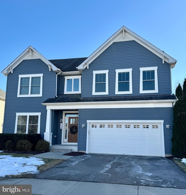 front of property featuring a garage