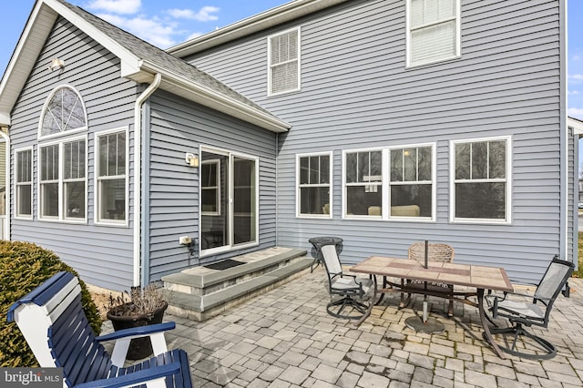 rear view of house with a patio