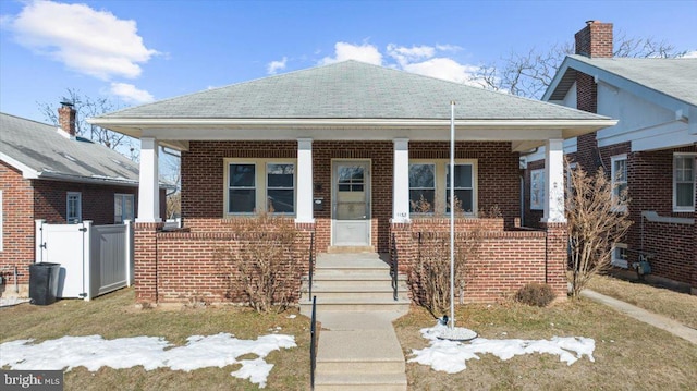 bungalow-style house featuring covered porch