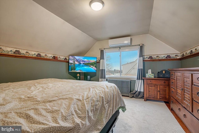 bedroom with lofted ceiling, radiator, light carpet, and a wall mounted AC