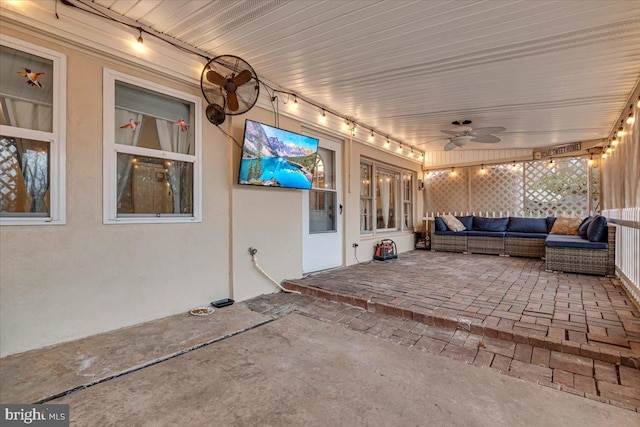 view of patio featuring outdoor lounge area and ceiling fan