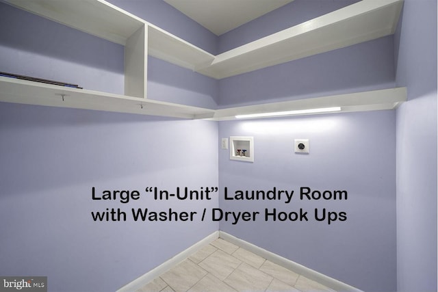 clothes washing area featuring washer hookup and electric dryer hookup