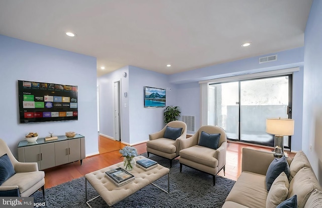 living room with wood-type flooring