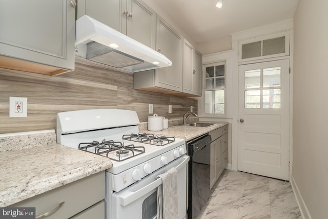 kitchen with sink, white range with gas stovetop, gray cabinets, black dishwasher, and decorative backsplash