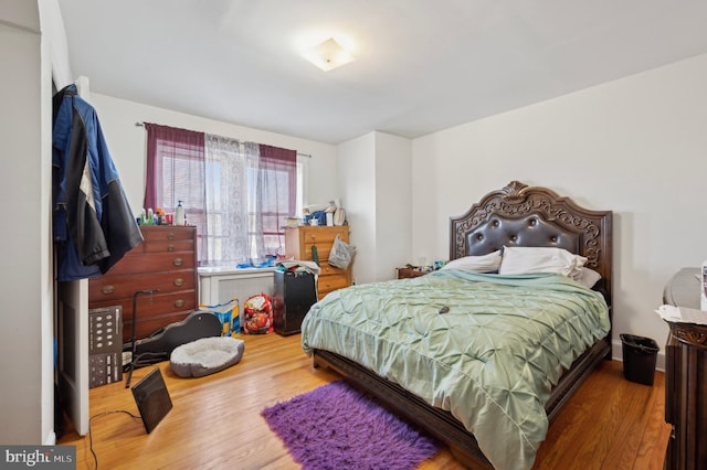 bedroom featuring hardwood / wood-style flooring