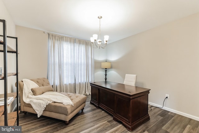 office area featuring dark hardwood / wood-style floors and a notable chandelier