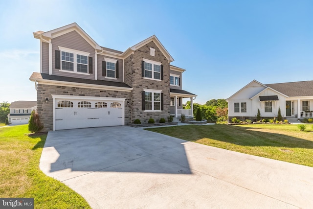 view of front of house featuring a garage, covered porch, and a front lawn