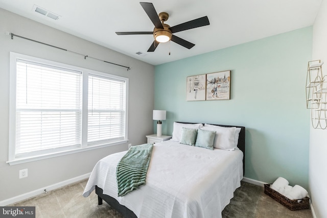 bedroom with ceiling fan and carpet