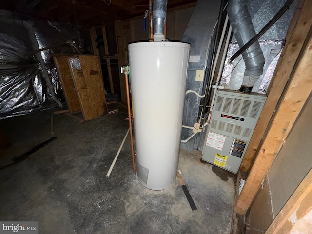 utility room with gas water heater