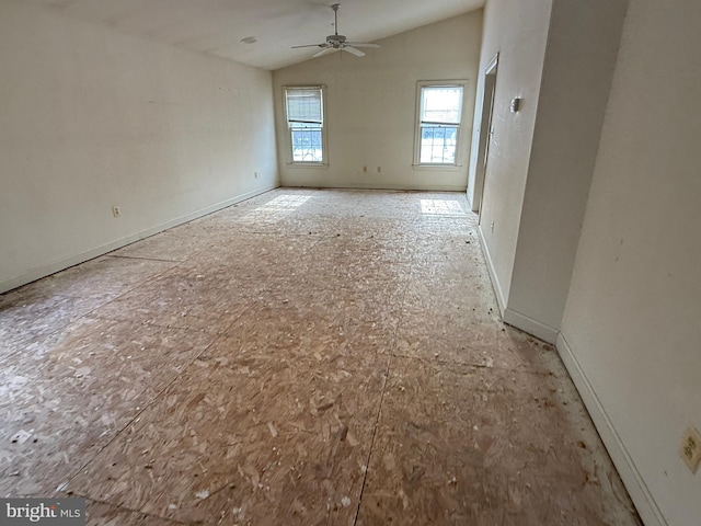 unfurnished room featuring ceiling fan and vaulted ceiling