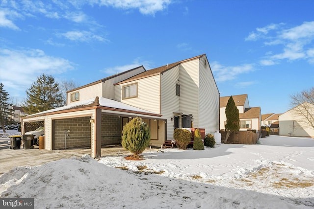 view of front of property with a garage