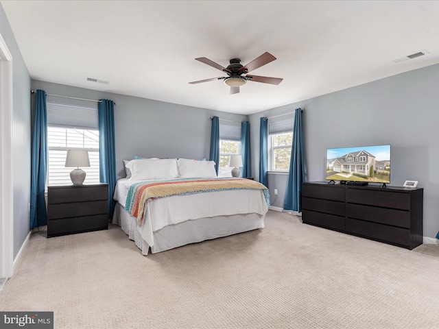 bedroom featuring ceiling fan and carpet flooring