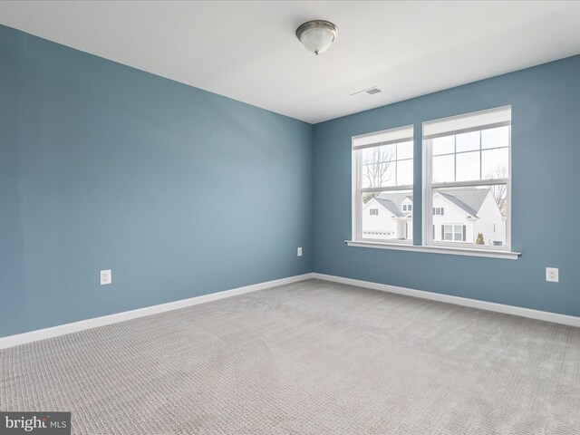 view of carpeted spare room
