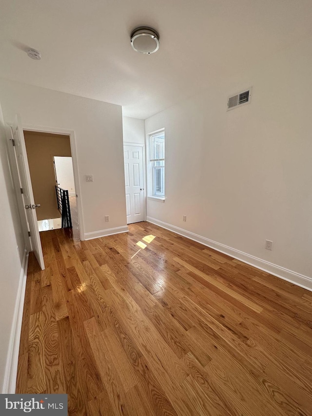 unfurnished bedroom featuring light hardwood / wood-style flooring