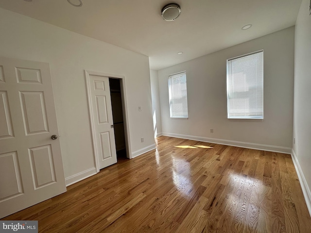 unfurnished bedroom featuring light hardwood / wood-style floors