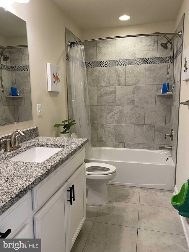 full bathroom featuring vanity, shower / bathtub combination with curtain, and toilet