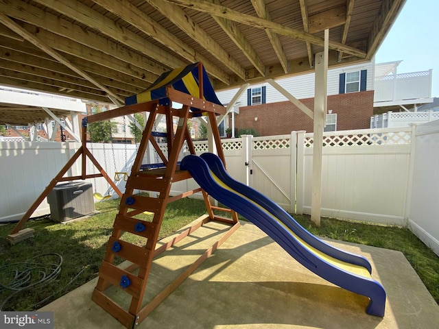 view of play area featuring central AC