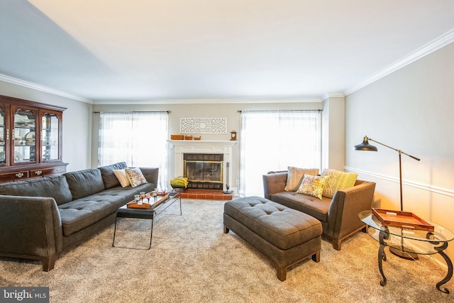 carpeted living room featuring ornamental molding, a healthy amount of sunlight, and a brick fireplace