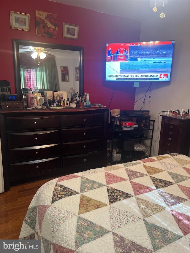 bedroom featuring hardwood / wood-style floors