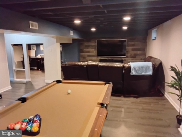 recreation room with hardwood / wood-style flooring and billiards