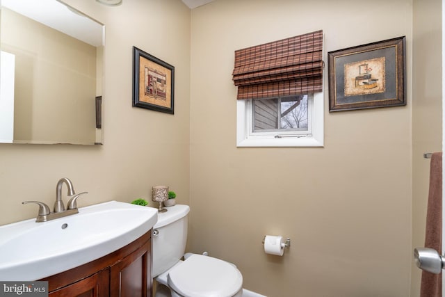 bathroom featuring sink and toilet