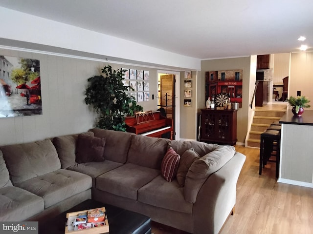 living room with light hardwood / wood-style flooring