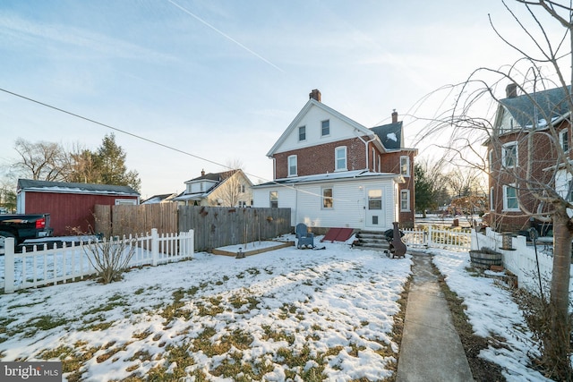 view of snow covered property