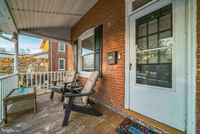 deck featuring covered porch