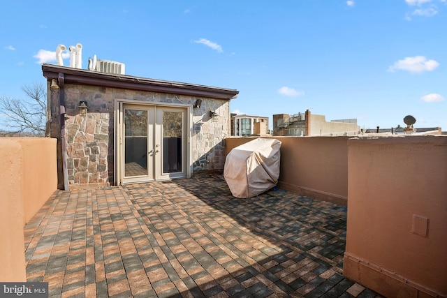 view of patio / terrace featuring french doors and area for grilling