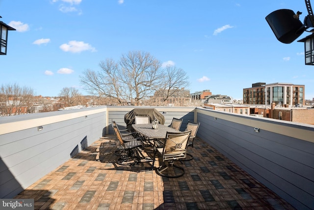 view of patio featuring a balcony