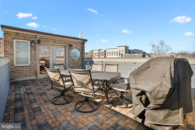 view of patio with grilling area and french doors