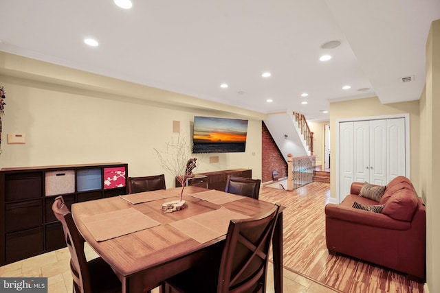 dining room featuring light hardwood / wood-style floors