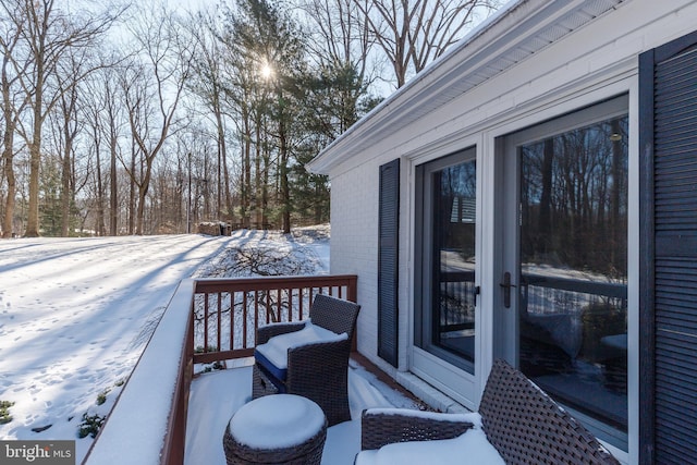 view of snow covered deck