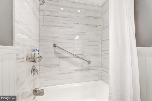 bathroom with shower / bathtub combination with curtain