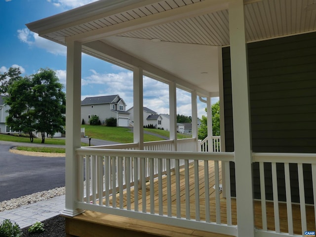 wooden terrace with covered porch