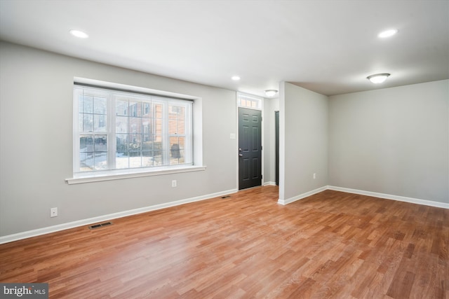 empty room with light wood-type flooring