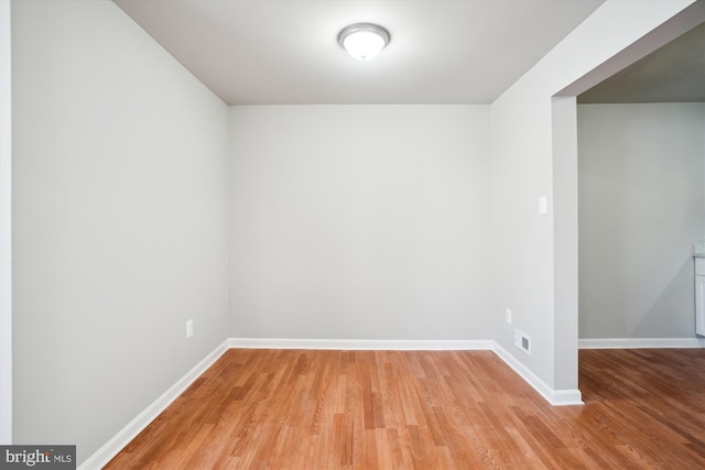 empty room with light wood-type flooring