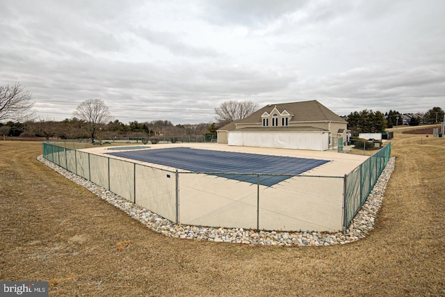 view of pool with fence, a lawn, and a fenced in pool