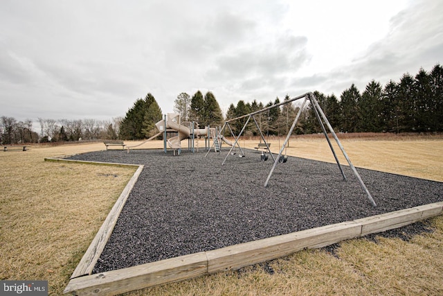 communal playground with a lawn